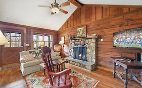 Log Cabin On Peaceful River